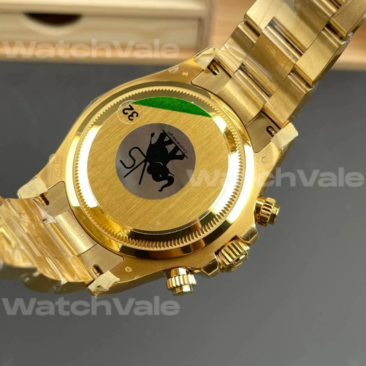 Close-up of Rolex Oyster Perpetual Cosmograph Daytona 116528 featuring champagne dial and black sub-dials