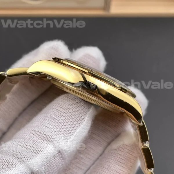 Rolex Daytona 116528 champagne dial chronograph watch with Oyster bracelet and engraved tachymeter bezel