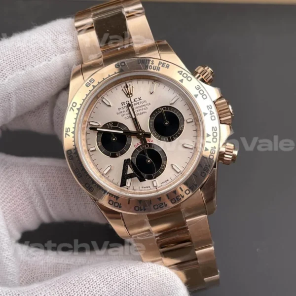 Close-up of a rose gold chronograph watch with sundust dial and tachymeter bezel