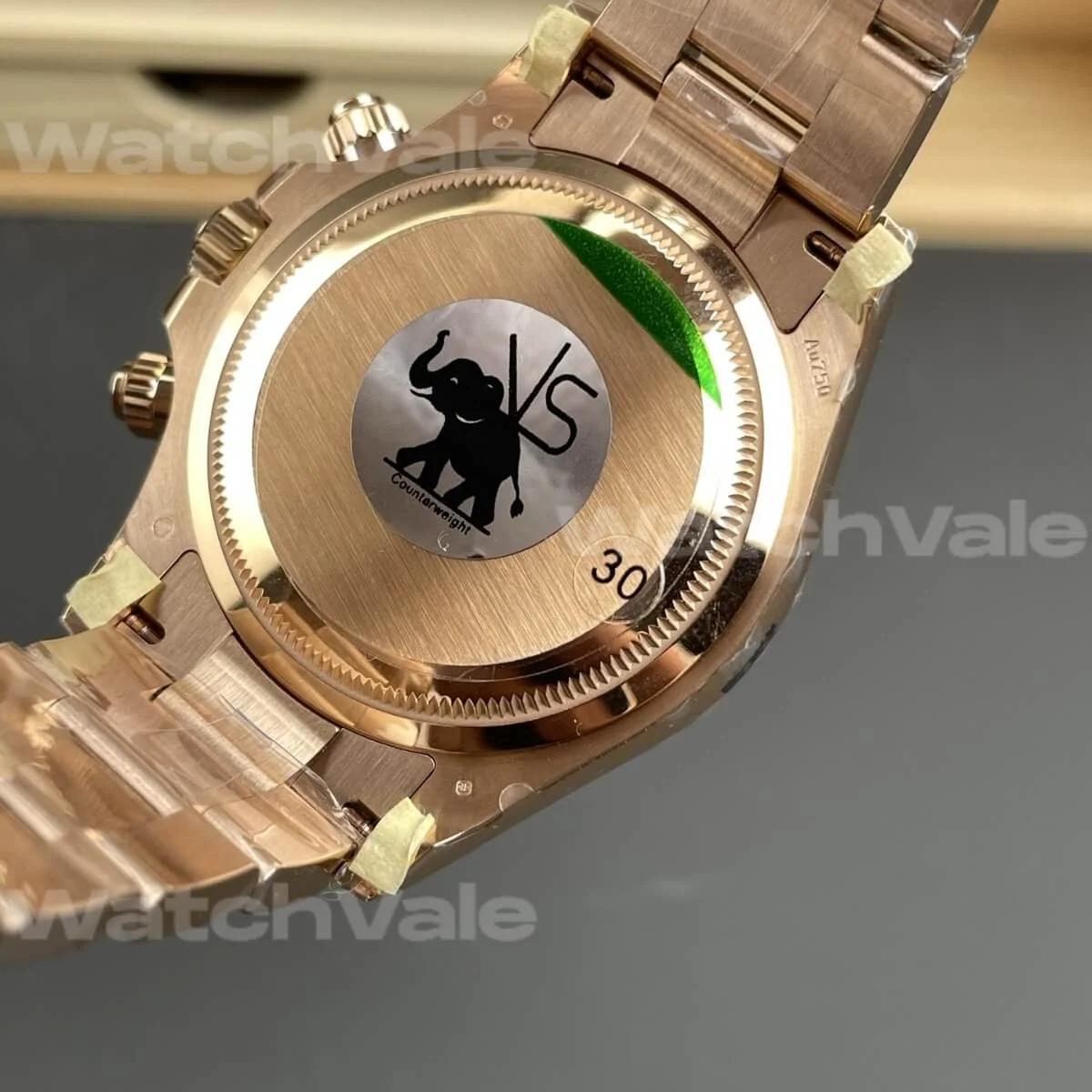 Rose gold luxury chronograph watch featuring a sundust dial and Oyster-style bracelet