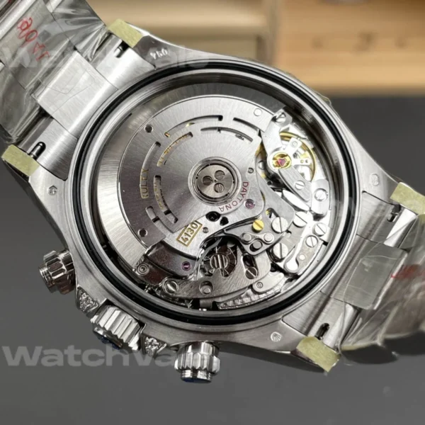 Rolex Cosmograph Daytona 126599TRU Ruby Bezel Super Clone Replica close-up of black dial