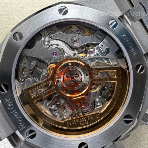 Black dial replica watch with chronograph subdials and date window close-up