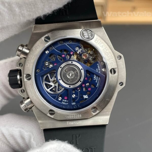 Skeleton dial replica watch with blue chronograph subdials close-up