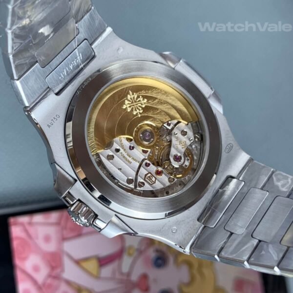 Blue dial replica watch with white gold hour markers and date window