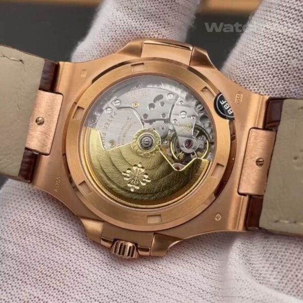 Charcoal brown dial replica watch with rose gold hour markers close-up