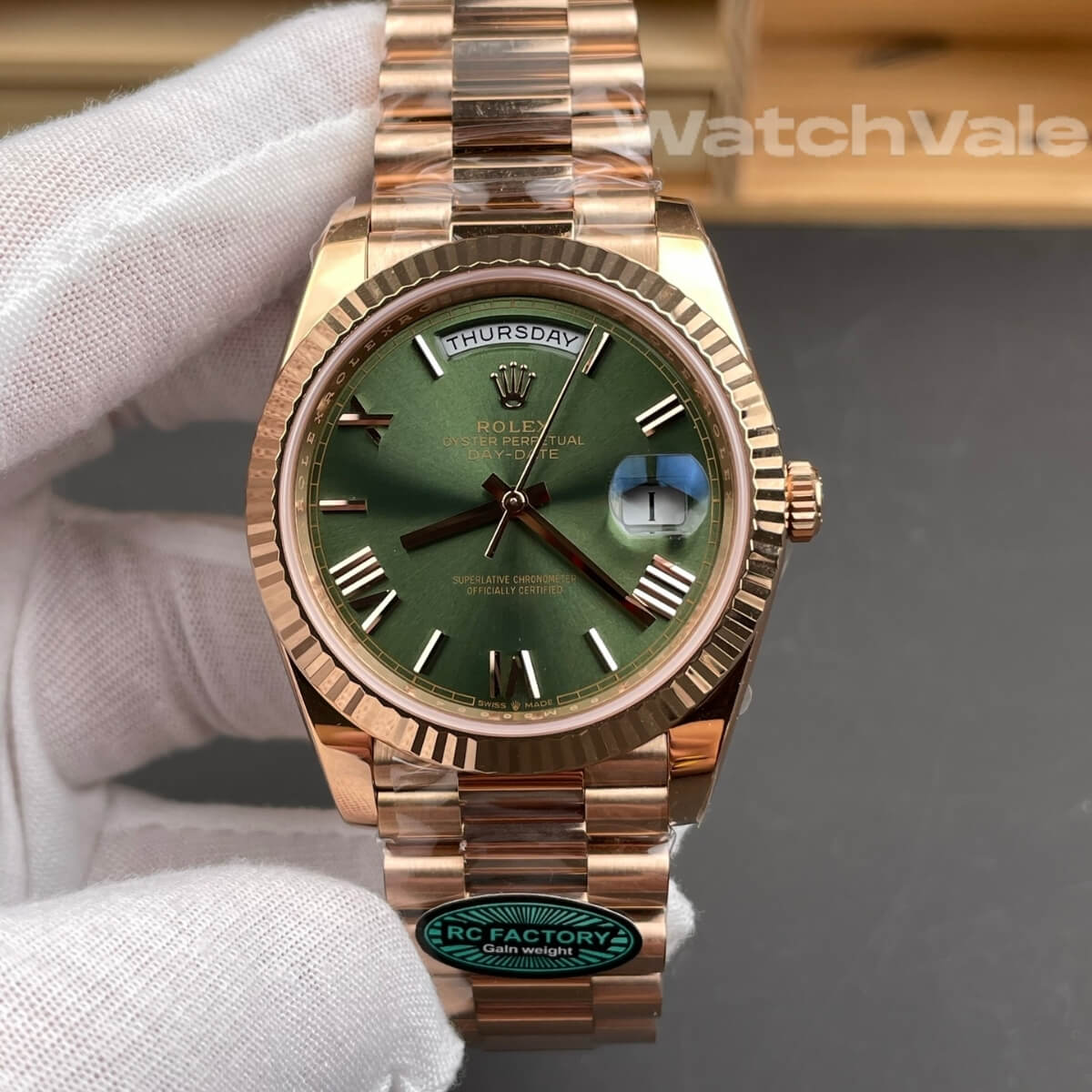 Rolex Day-Date 228235 olive green dial close-up replica watch