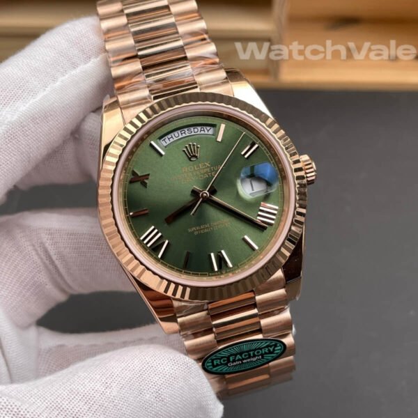 Rolex Day-Date 40 228235 Everose gold President bracelet replica on wrist