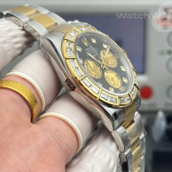Diamond dial replica watch with gold toned hour markers close-up