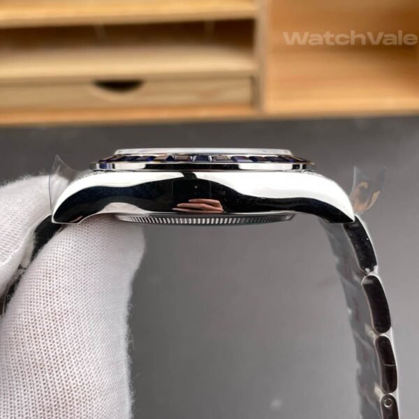 Obsidian dial replica watch with white gold hour markers close-up